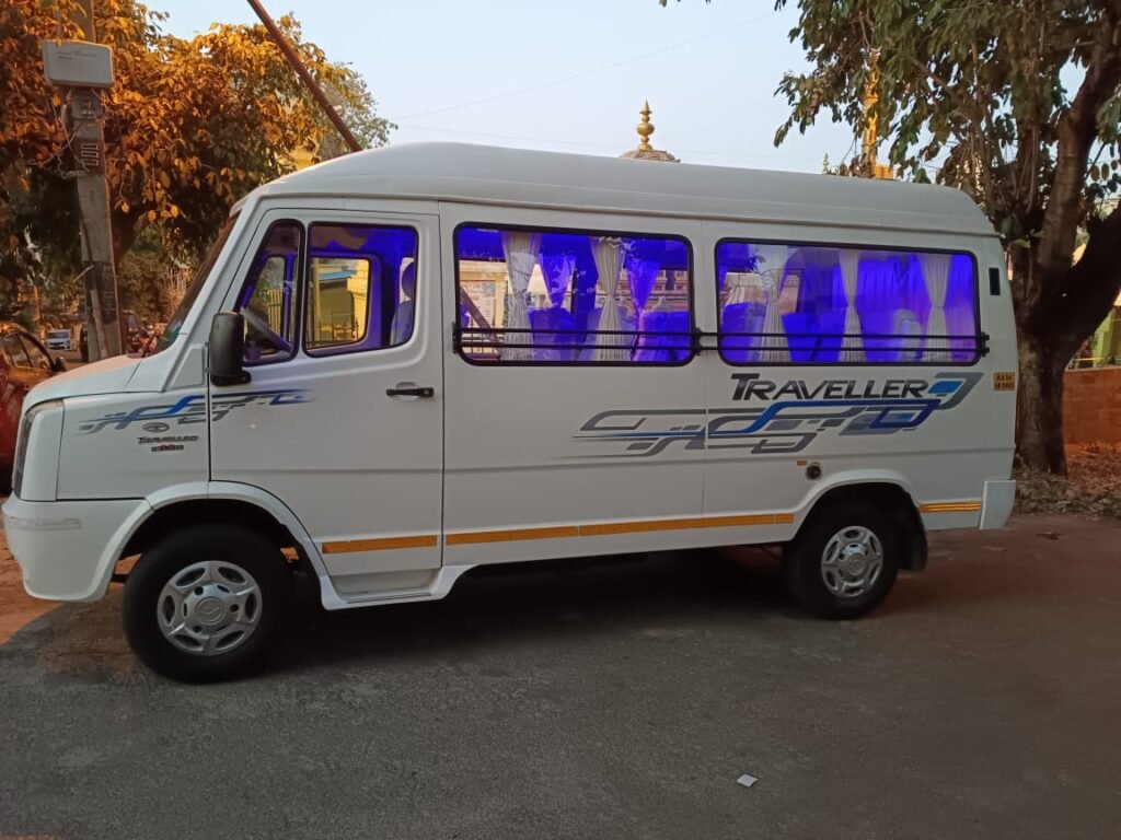 Side profile of 10 seater luxury tempo traveller in Bangalore with stylish graphics – luxury tempo traveller for rent in Bangalore