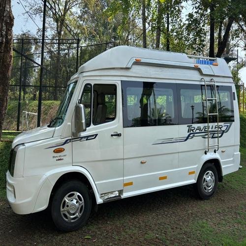 Side profile of 10 seater luxury tempo traveller in Bangalore with stylish graphics – luxury tempo traveller for rent in Bangalore