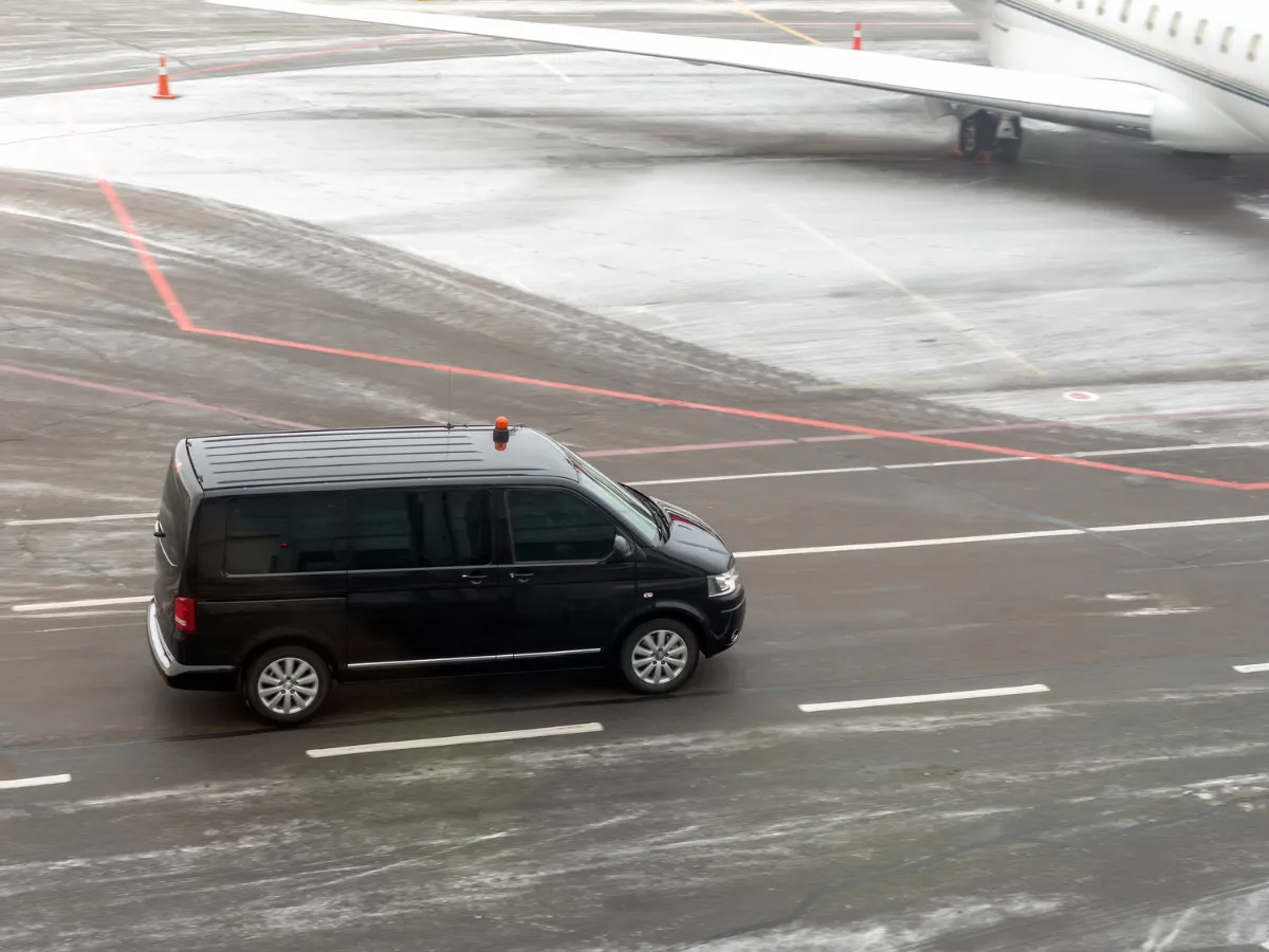 Van airport transfer for groups at Bangalore airport